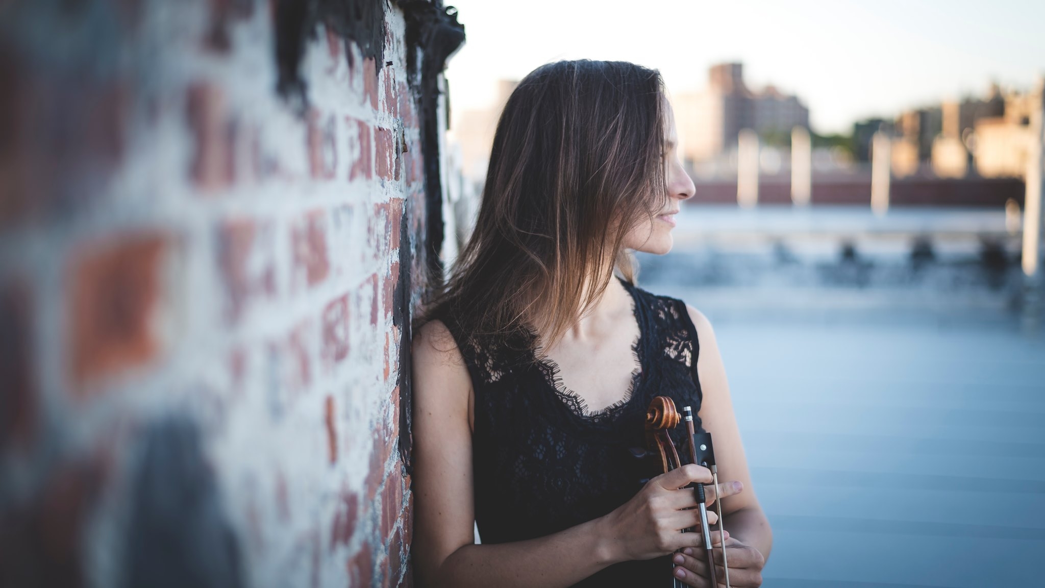 Music with Celine Boulben holding violin