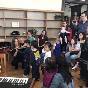 Music with Celine Boulben teaching violin